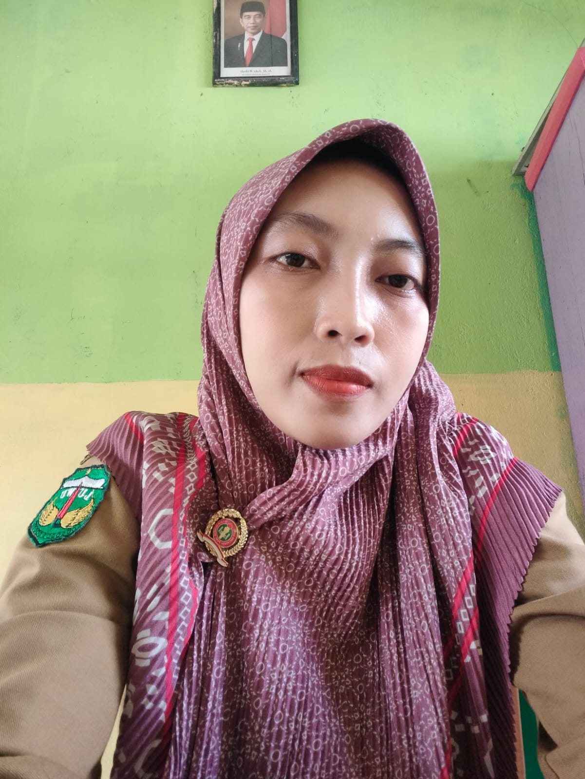 IVO SUKMAWAN,S.Pd.SD